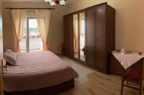 Postel nebo postele na pokoji v ubytování Belvedere Centro Shkoder