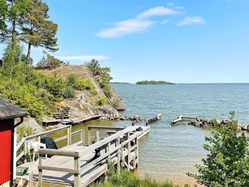 a dock in the water next to a body of water at 8 person holiday home in BRÅLANDA-By Traum in Brålanda