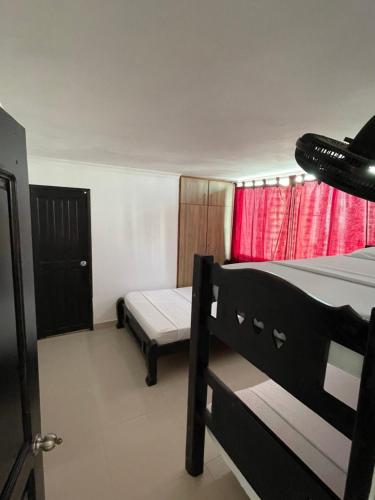 Postel nebo postele na pokoji v ubytování Alojamientos Cartagena Edificio Los Delfines