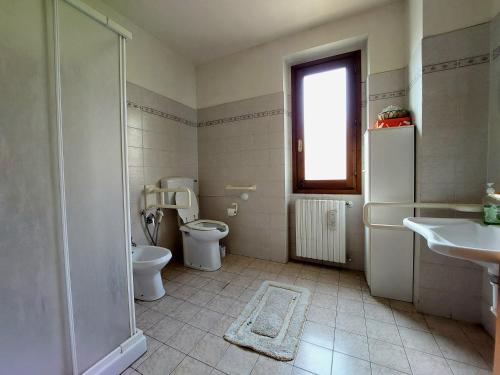 Ett badrum på Casa Vacanze - La Ginestra