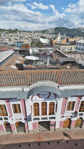 an overhead view of a building in a city at Carlota Sustainable Design Hotel in Quito