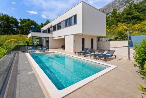Luxury, seafront Villa IVAN with heated pool only 100m from beach