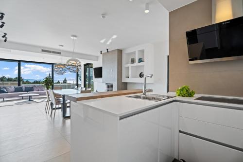 Luxury, seafront Villa IVAN with heated pool only 100m from beach