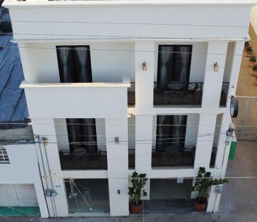 a model of a house with windows at Hotel Reforma in Tuxpan