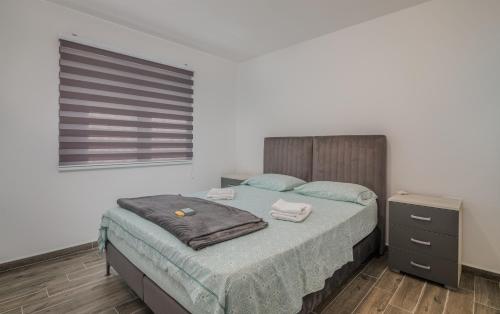 Katil atau katil-katil dalam bilik di Apartment Diva