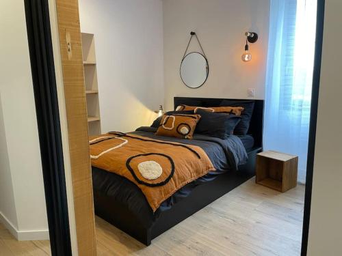 Postel nebo postele na pokoji v ubytování Gîte Au Bout du Lac