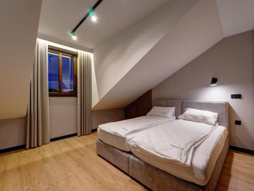Ένα ή περισσότερα κρεβάτια σε δωμάτιο στο Stek Apartments ApartHotel
