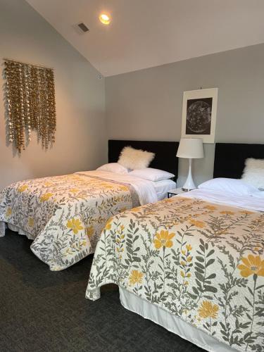 Ένα ή περισσότερα κρεβάτια σε δωμάτιο στο Blue Star Motel