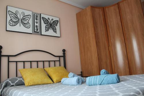 A bed or beds in a room at Corralón Tahonas. Centro histórico