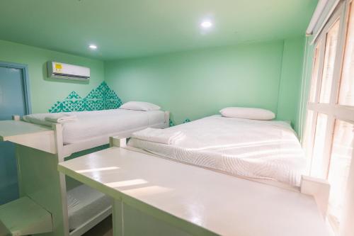 Postel nebo postele na pokoji v ubytování San Felicin Hostel
