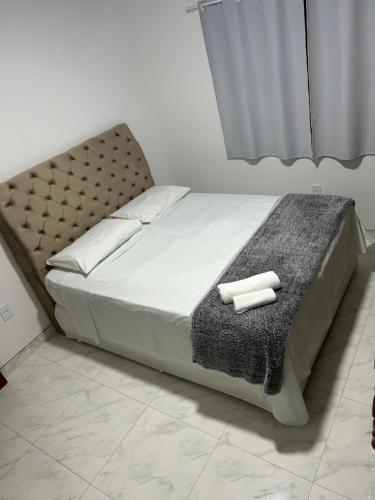 Ein Bett oder Betten in einem Zimmer der Unterkunft Casa de praia 6km Beto Carrero - Praia Gravatá
