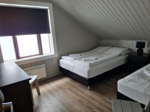 Кровать или кровати в номере Lava Guesthouse