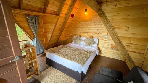 Una cama o camas en una habitación de Glamping Magic Love