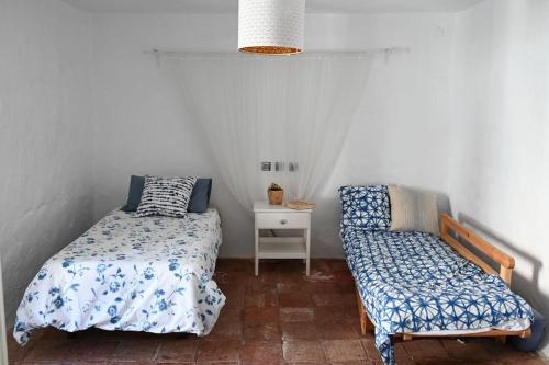 Postel nebo postele na pokoji v ubytování Casa Andreas
