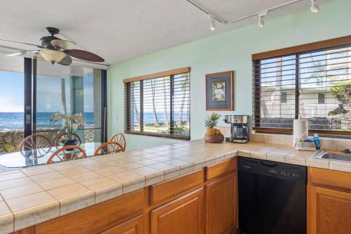 Gallery image of Step Into the Ocean from your Lanai @ Kona Reef D-8 in Kailua-Kona
