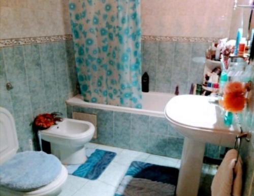 a bathroom with a toilet and a sink and a shower at ÆrtisticŠpace In The Center Room in Tangier