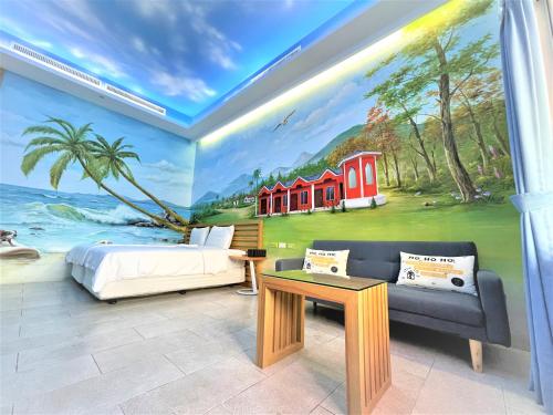 垦丁大街垦丁海明威旅店的带有海洋壁画的卧室