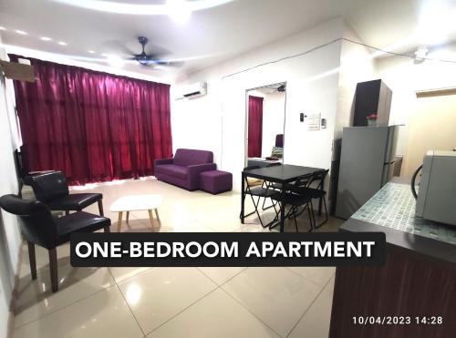 a one bedroom apartment with a living room and dining room at Shah Suites Vista Alam in Shah Alam