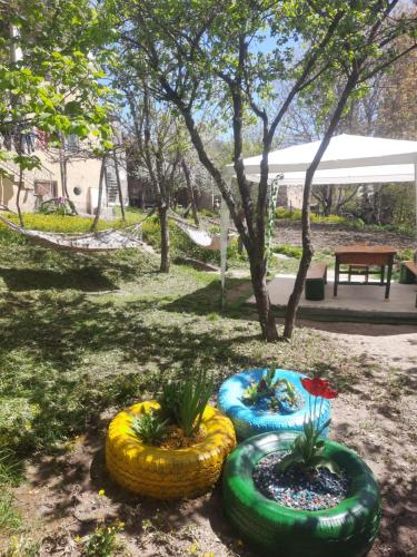 two inflatable plants in the grass in a park at LeriMari in Mestia