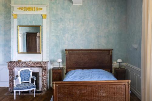 Postel nebo postele na pokoji v ubytování Le Domaine de Langlardie