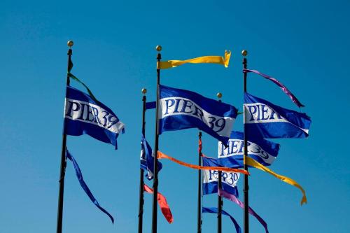 four blue flags with the pepsi logo on them at Courtyard by Marriott Fishermans Wharf in San Francisco