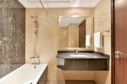Vannas istaba naktsmītnē Residences at Elite Downtown Dubai