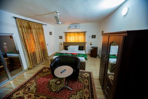 Katil atau katil-katil dalam bilik di Nap Apartment Hotel