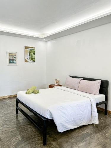 Postel nebo postele na pokoji v ubytování Treeshade Resort & Spa Moalboal