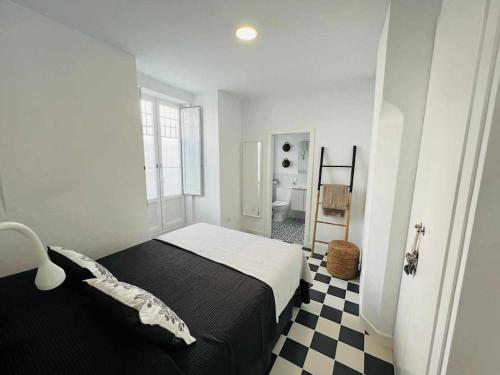 En eller flere senge i et værelse på Casa Las 4 Esquinas by Casas con Encanto