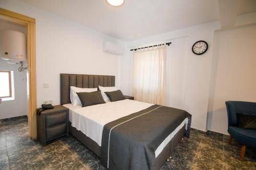 Ένα ή περισσότερα κρεβάτια σε δωμάτιο στο Swan Boutique Hotel