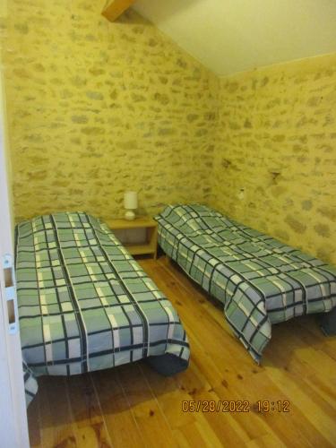 Posteľ alebo postele v izbe v ubytovaní Le Mas du Sourdet