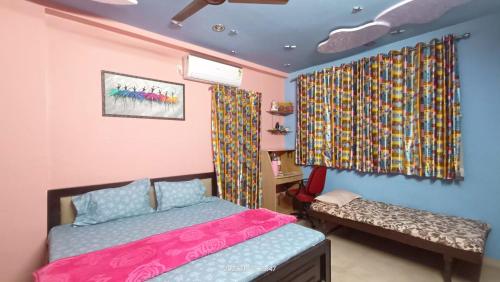 Postel nebo postele na pokoji v ubytování Gaurang Homestay