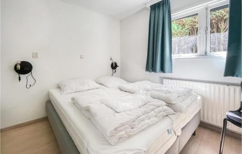 Postel nebo postele na pokoji v ubytování Stunning stacaravan In Putten With Wifi