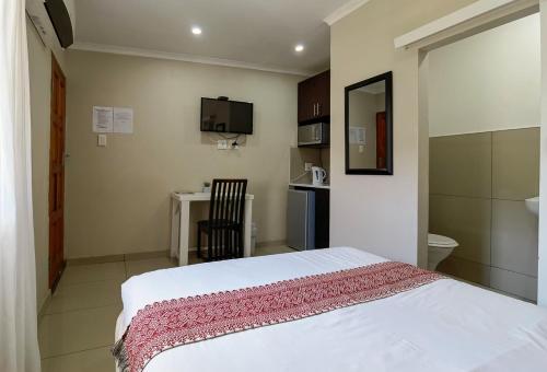 Katil atau katil-katil dalam bilik di Ballito Backpackers