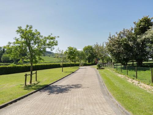 a road in a park with trees and grass at Ballyboy View in Manorhamilton