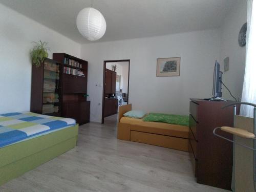 Postel nebo postele na pokoji v ubytování Soukromé pokoje