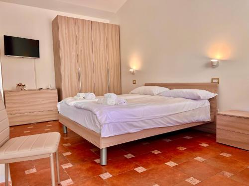 Кровать или кровати в номере Il Vigneto Country House