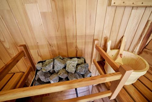 an overhead view of a sauna with a pile of rocks at TOCORO. Mt.Fuji The Airstream Kawaguchiko Station in Azagawa