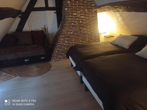 Un lugar para sentarse en Gite écurie familly