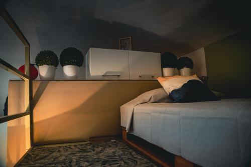 Ένα ή περισσότερα κρεβάτια σε δωμάτιο στο rilassante casa a Torino