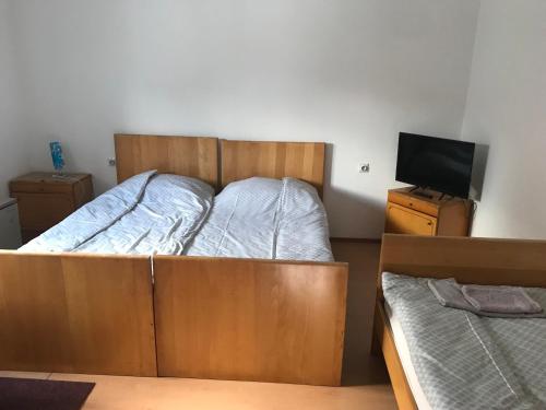 Postel nebo postele na pokoji v ubytování Apartman KEC - Apatin