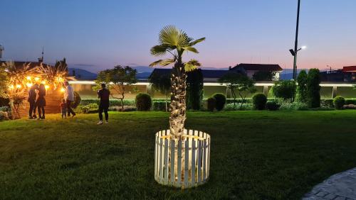 a sculpture of a palm tree in a park at Spa Hotel Ezeretz Blagoevgrad in Blagoevgrad