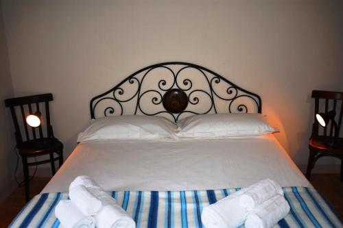 Katil atau katil-katil dalam bilik di Agriturismo Il Loppo, your Home in the Woods
