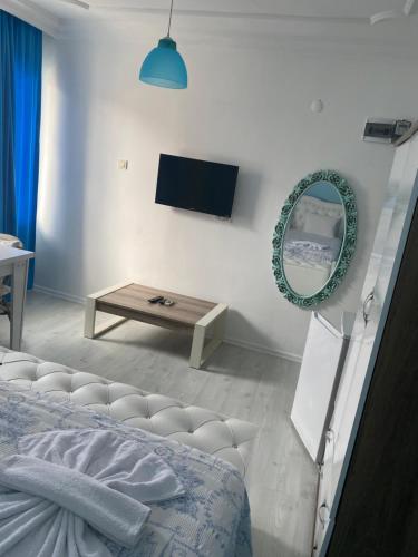 Cama o camas de una habitación en Mavi Butik Apart