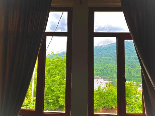a window with a view of a mountain at Dil Hill by Sam in Dilijan