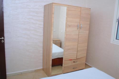 Postel nebo postele na pokoji v ubytování Jnane Eddalya