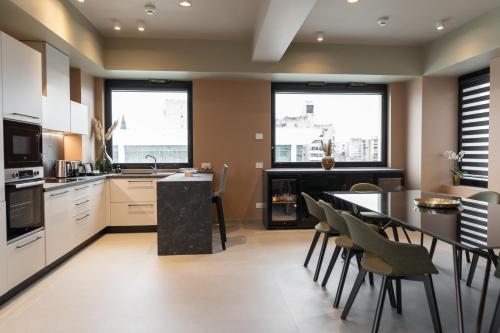 Η κουζίνα ή μικρή κουζίνα στο The Dome Aparthotel