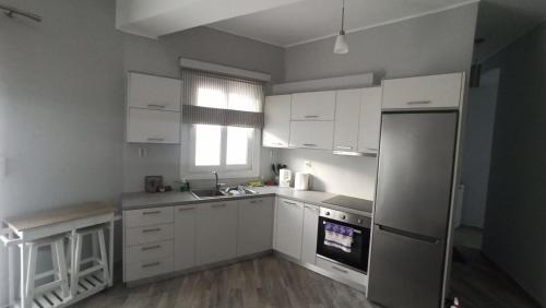 Una cocina o cocineta en AKTI Apartment