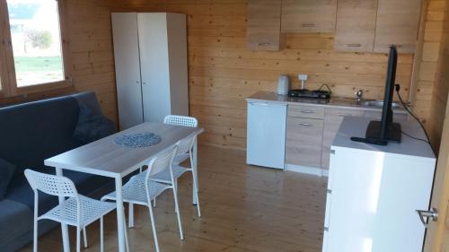 Η κουζίνα ή μικρή κουζίνα στο Domki u Basi