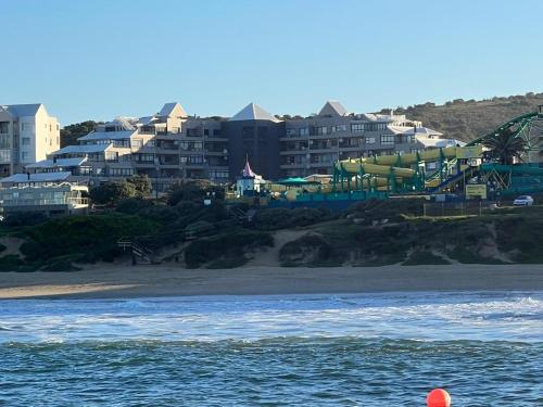 a view of a beach with a water park at Diaz De Valle 35 in Mossel Bay